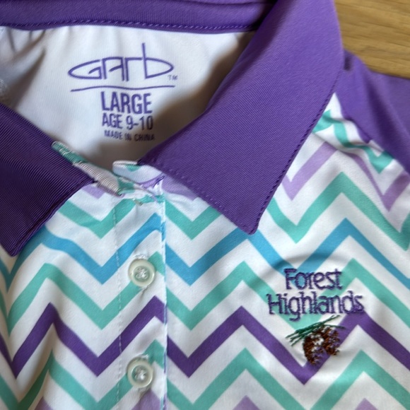 LIKE NEW, girls golf polo size 9-10. No rips, stains nor tears. Worn twice. - Picture 2 of 3